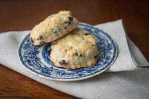 Homemade scones with raisins on plate