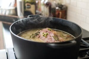 Cooking broth with herbs and meat