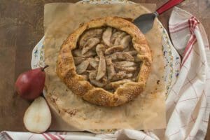 Freshly baked dessert with whole pear