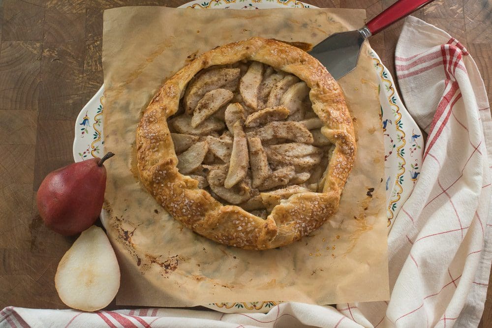 Freshly baked dessert with whole pear