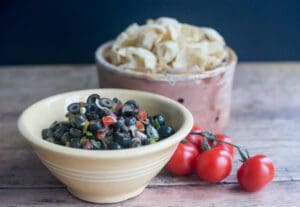 Salsa and chips with tomatoes