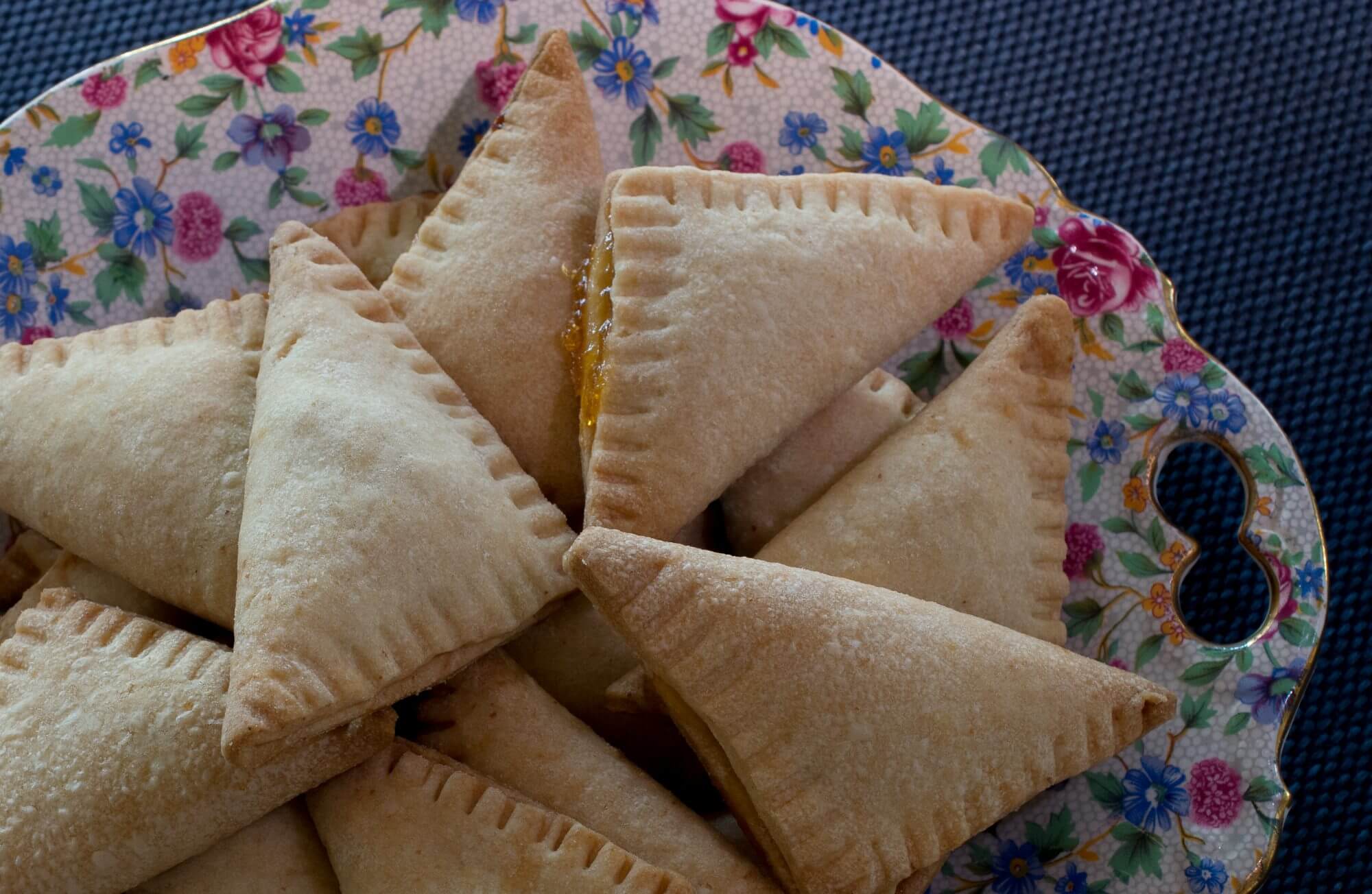 Delicious baked pastries on decorative dish