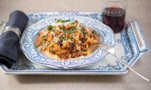Elegant dinner setting with pasta