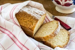 Freshly baked bread with knife nearby