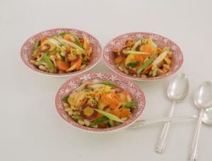 Three vibrant vegetable salads in bowls