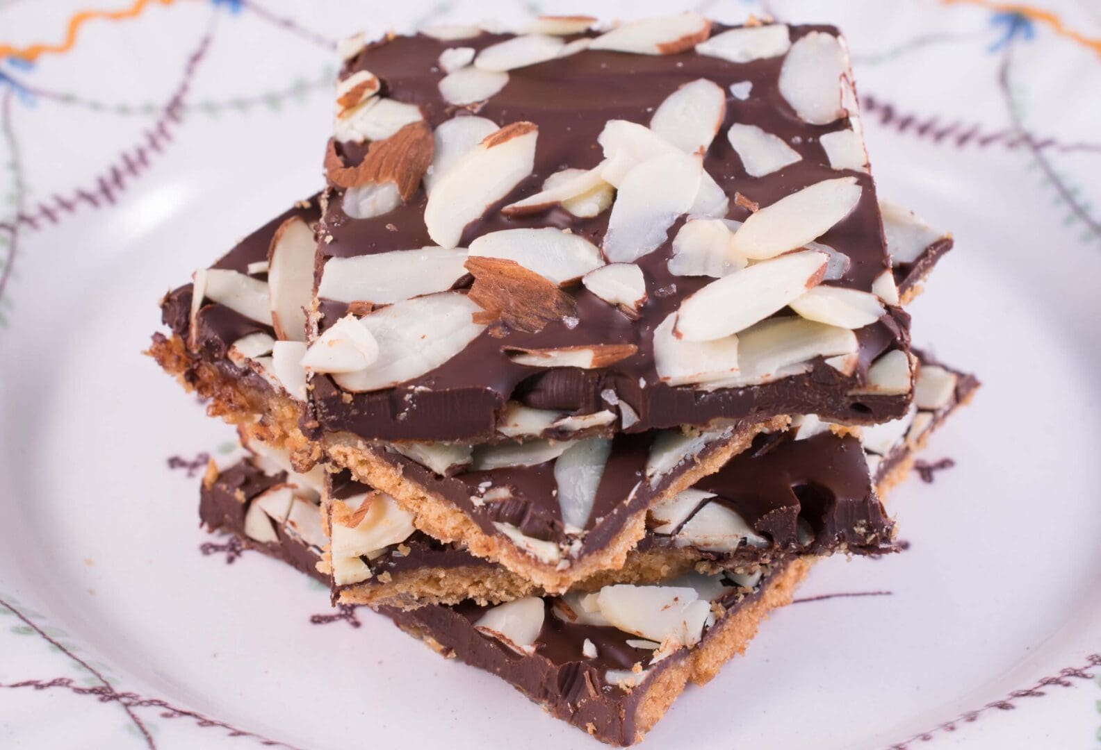 Sliced almonds on chocolate-covered bars