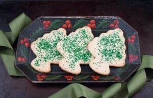 Festive cookies on decorated tray