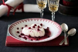 Dessert with pomegranate seeds on plate