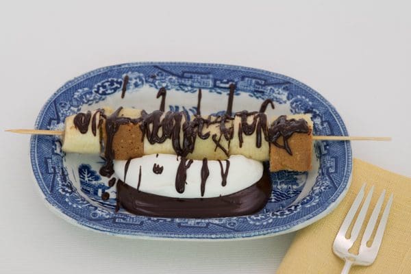 Pastry skewer on decorative plate