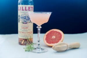 Grapefruit cocktail with Lillet bottle