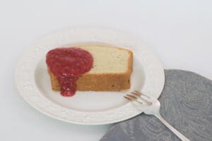 Cake slice with berry sauce