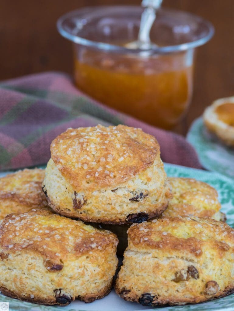 Freshly baked scones with apricot jam