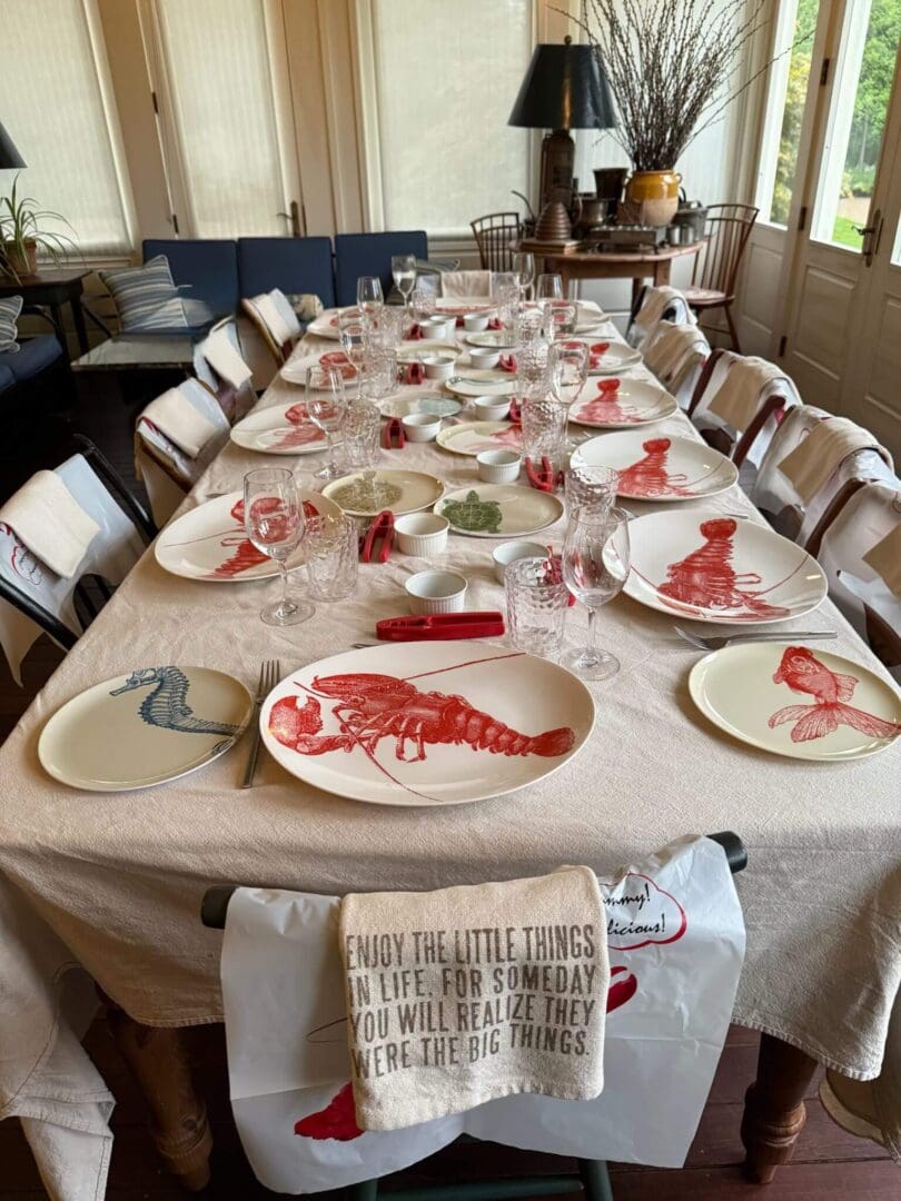 Lobster-themed dining table set for guests.