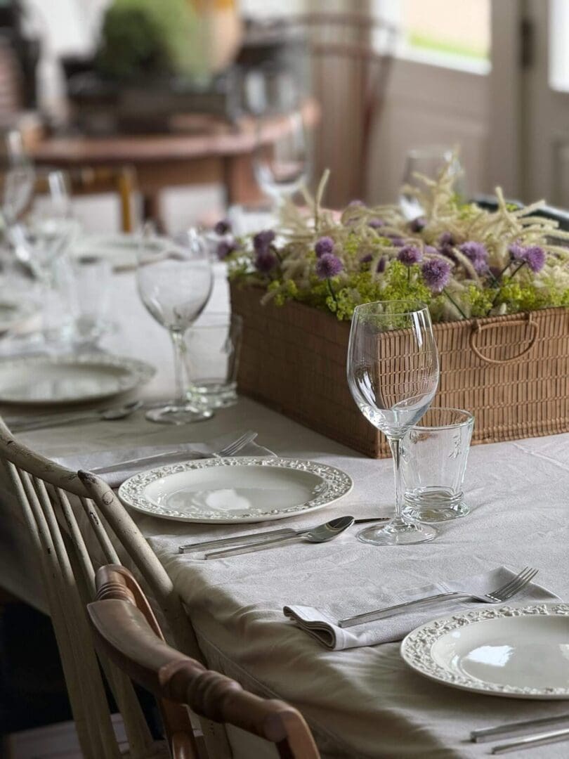 Elegant table setting with floral centerpiece.