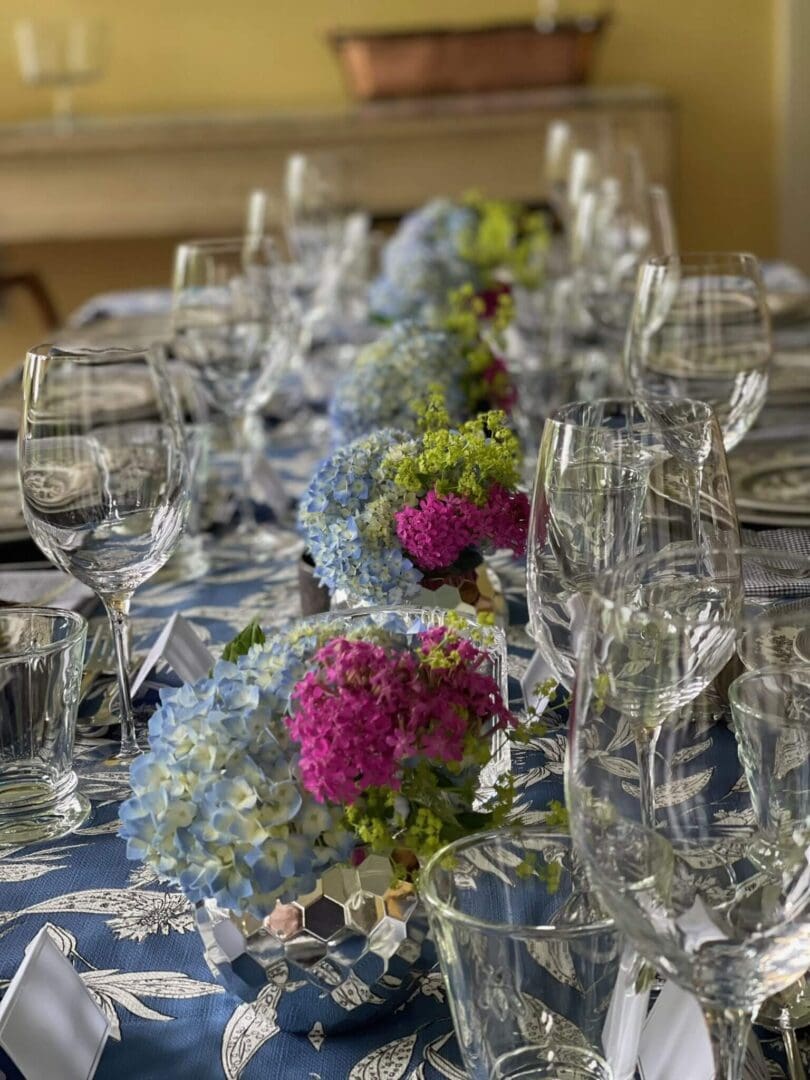 Elegant table setting with floral centerpieces.