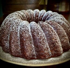 Chocolate bundt cake dusted with powdered sugar